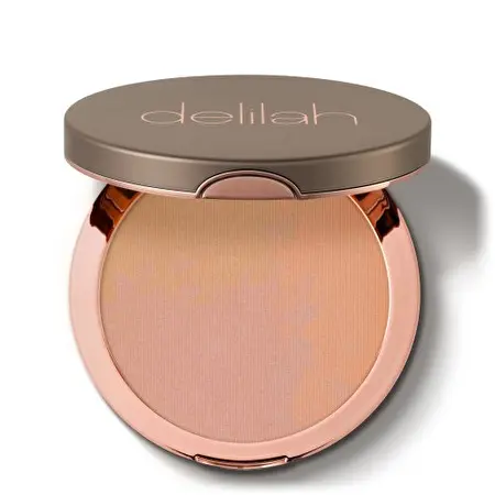 Delilah Pure Light Illuminating Powder Švytėjimo suteikianti presuota pudra Aura 2301, 9.9g (be pakuotės)